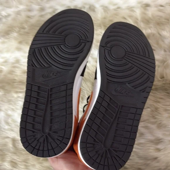 Air Jordan Black and Orange Sneakers